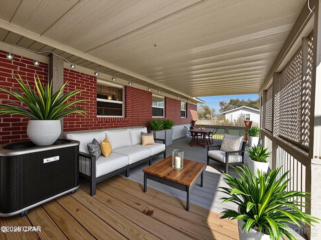 deck with an outdoor hangout area and outdoor dining area
