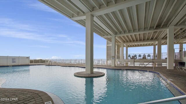 14401 Front Beach Rd Unit 432, Panama City Beach, FL 32413 - community pool featuring fence and a water view