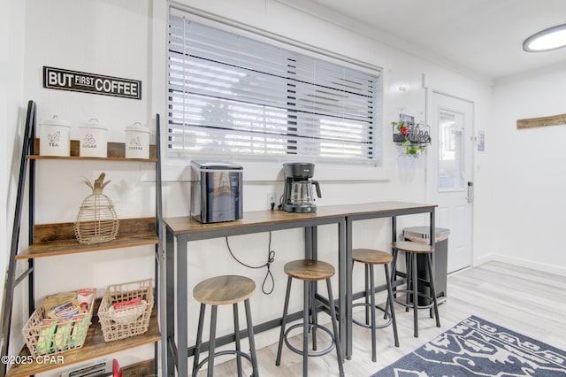 kitchen with light wood-style floors and baseboards