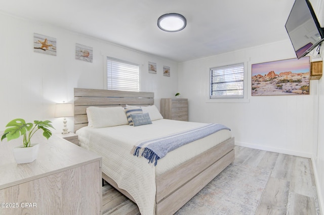 bedroom featuring light wood finished floors