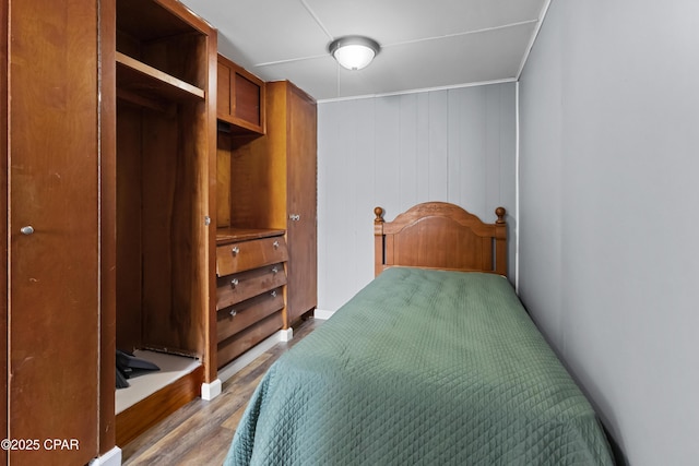 bedroom with light wood-type flooring