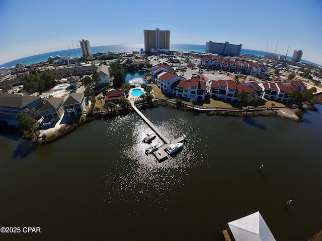 aerial view with a water view and a view of city