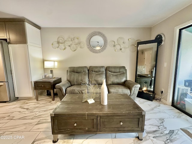 living room with marble finish floor