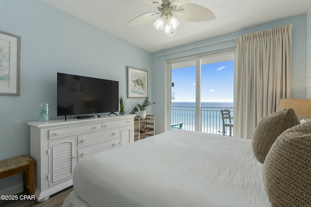12011 Front Beach Rd Unit 204B, Panama City Beach, FL 32407 - bedroom featuring access to outside, dark wood-type flooring, a ceiling fan, and baseboards
