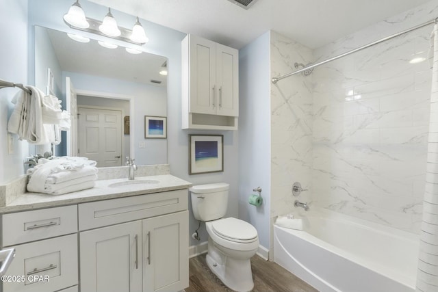 12011 Front Beach Rd Unit 204B, Panama City Beach, FL 32407 - full bath with toilet, vanity,  shower combination, wood finished floors, and baseboards