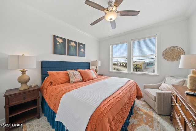 bedroom with crown molding and ceiling fan