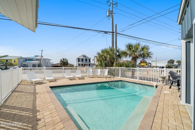 view of pool with a patio, fence, and a fenced in pool