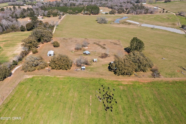 drone / aerial view with a rural view and a water view