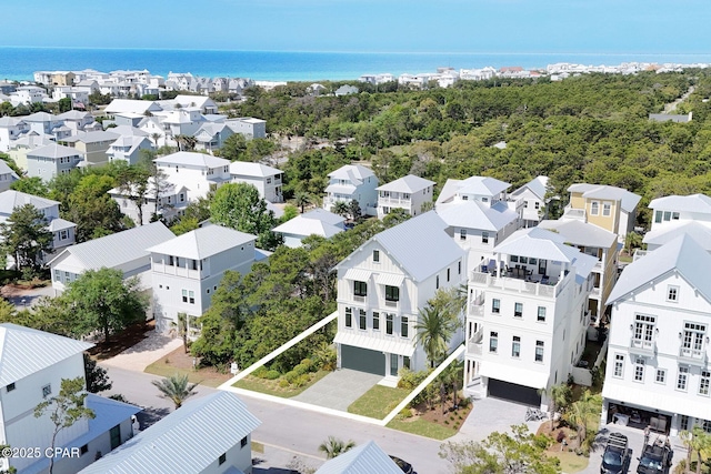 aerial view with a water view and a residential view