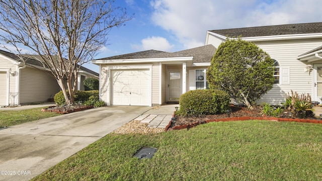 view of front of property with a garage, a front yard, driveway, and a shingled roof