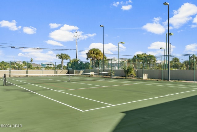 view of sport court with community basketball court and fence