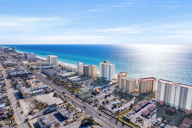 birds eye view of property with a city view and a water view