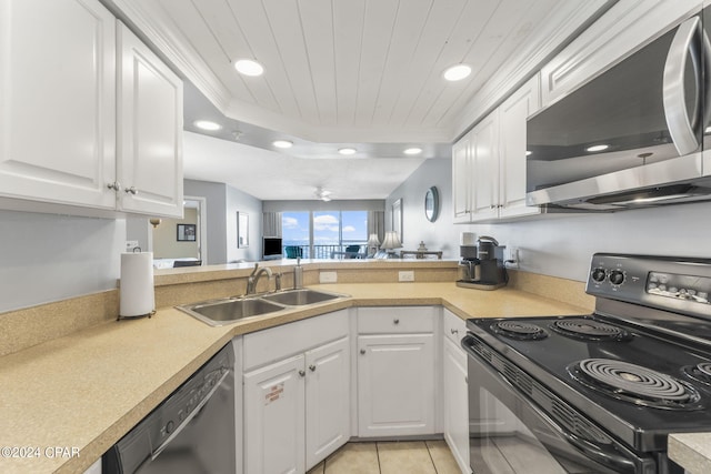 kitchen featuring wood ceiling, light tile patterned flooring, black appliances, a raised ceiling, and a sink