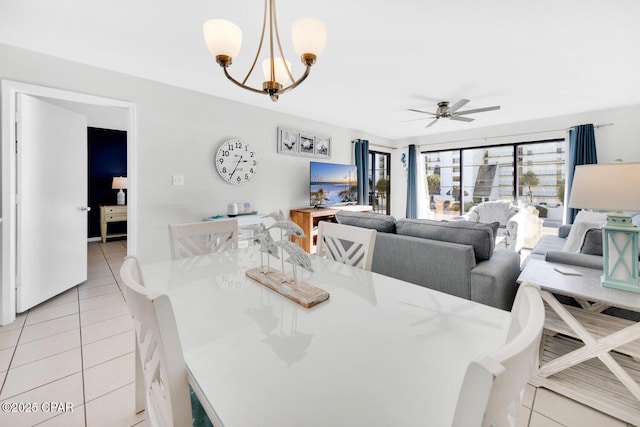520 Richard Jackson Blvd Unit 3308, Panama City Beach, FL 32407 - dining room with light tile patterned flooring and ceiling fan with notable chandelier