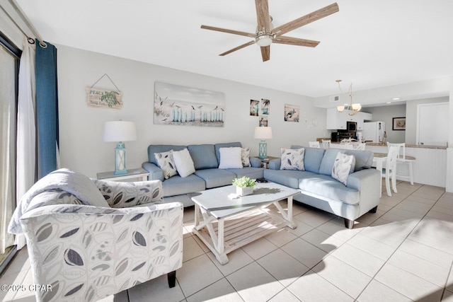 520 Richard Jackson Blvd Unit 3308, Panama City Beach, FL 32407 - living room featuring light tile patterned floors and ceiling fan with notable chandelier