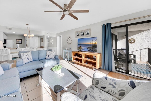 520 Richard Jackson Blvd Unit 3308, Panama City Beach, FL 32407 - living room featuring light tile patterned floors, visible vents, and ceiling fan with notable chandelier