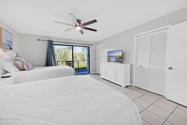 520 Richard Jackson Blvd Unit 3308, Panama City Beach, FL 32407 - bedroom featuring access to outside, light tile patterned floors, multiple closets, and ceiling fan