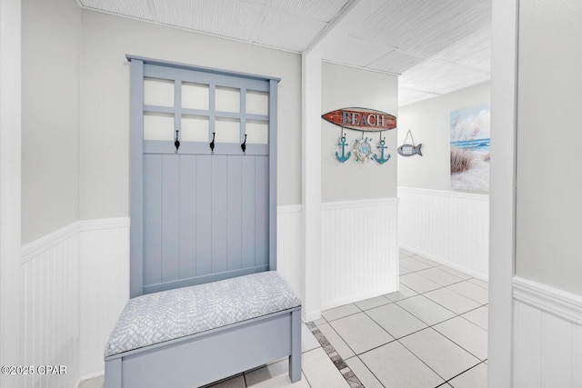 520 Richard Jackson Blvd Unit 3308, Panama City Beach, FL 32407 - mudroom featuring tile patterned flooring and wainscoting