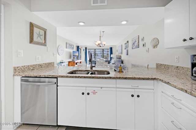 520 Richard Jackson Blvd Unit 3308, Panama City Beach, FL 32407 - kitchen featuring visible vents, light stone countertops, dishwasher, an inviting chandelier, and a sink