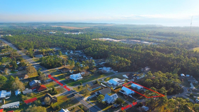 drone / aerial view with a view of trees