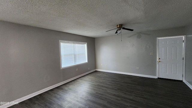 unfurnished room featuring a textured ceiling, baseboards, ceiling fan, and dark wood-style flooring