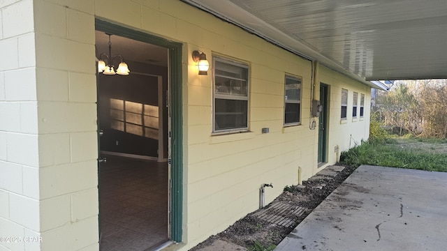 exterior space with concrete block siding