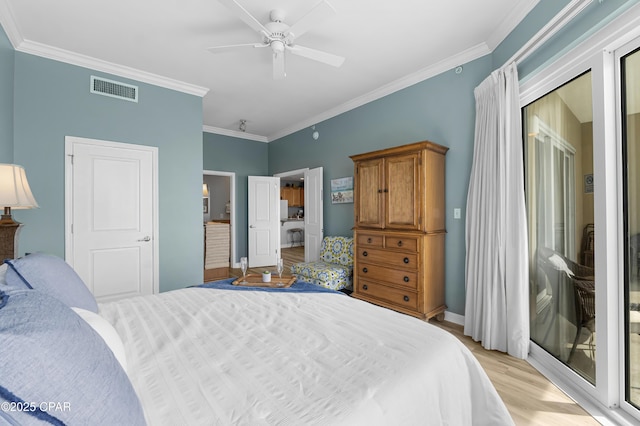 bedroom featuring visible vents, baseboards, a ceiling fan, ornamental molding, and light wood-type flooring