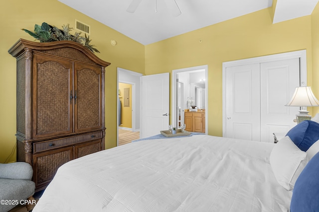 bedroom featuring a closet, visible vents, connected bathroom, and ceiling fan