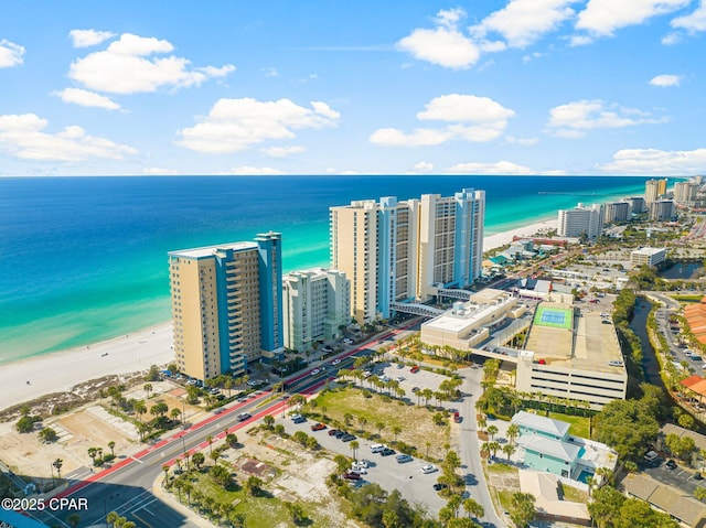 aerial view with a view of the beach, a view of city, and a water view