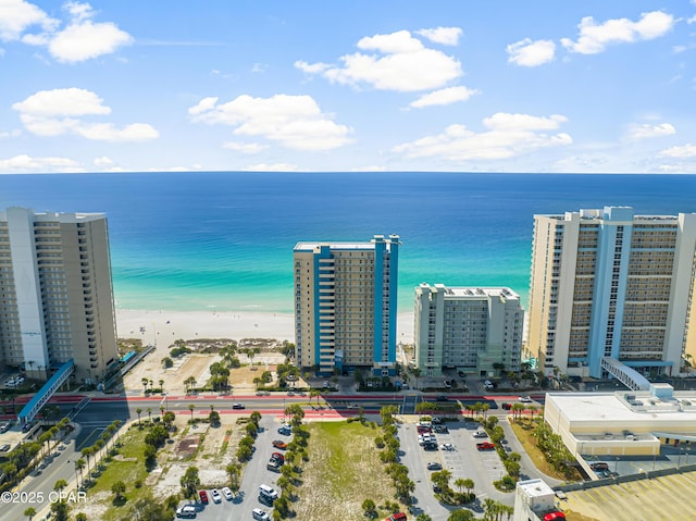 drone / aerial view with a view of city and a water view