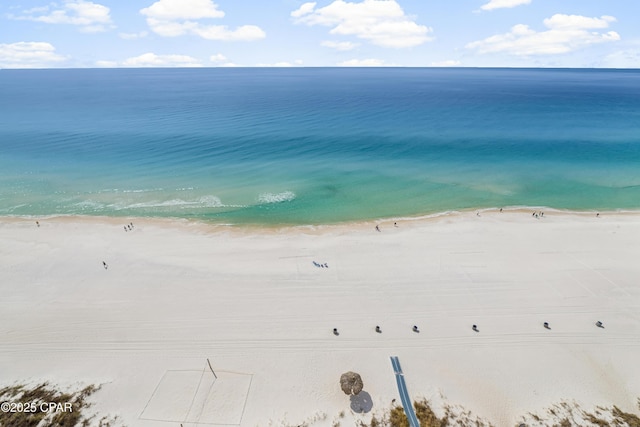 bird's eye view with a water view and a view of the beach