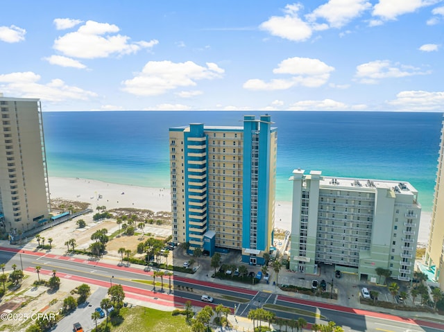 bird's eye view with a beach view and a water view