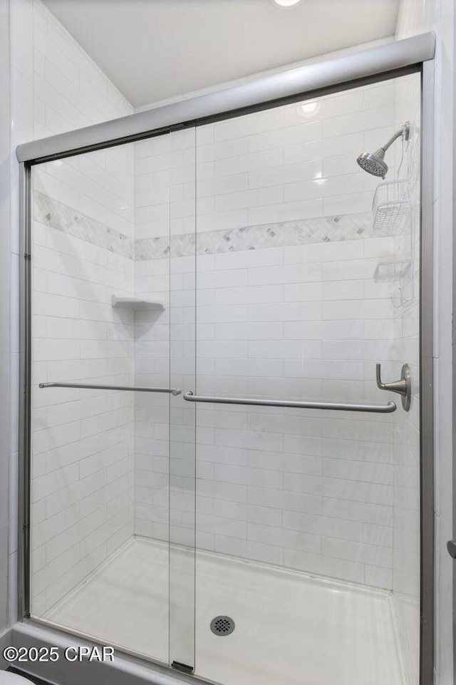 bathroom with a stall shower