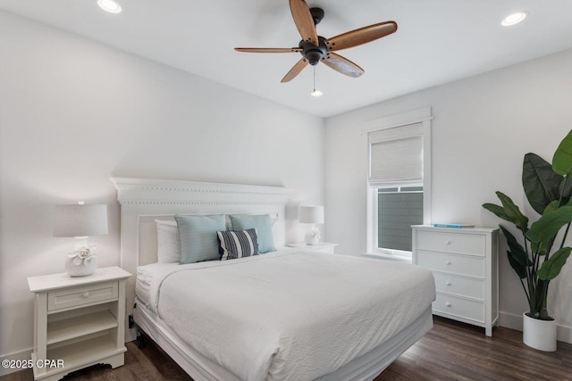 bedroom with recessed lighting, baseboards, dark wood-type flooring, and a ceiling fan