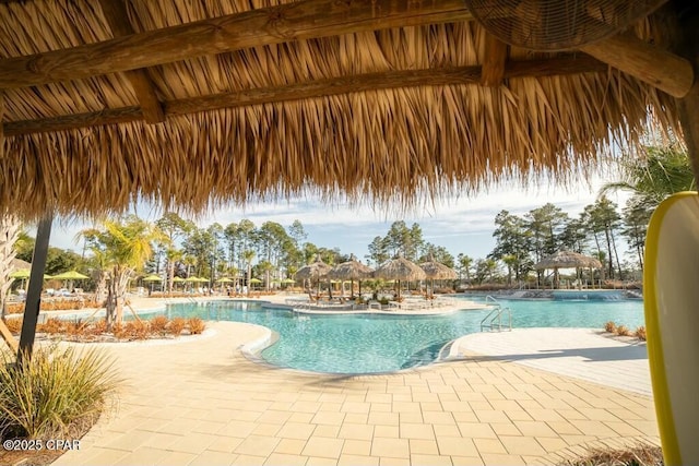 community pool with a patio