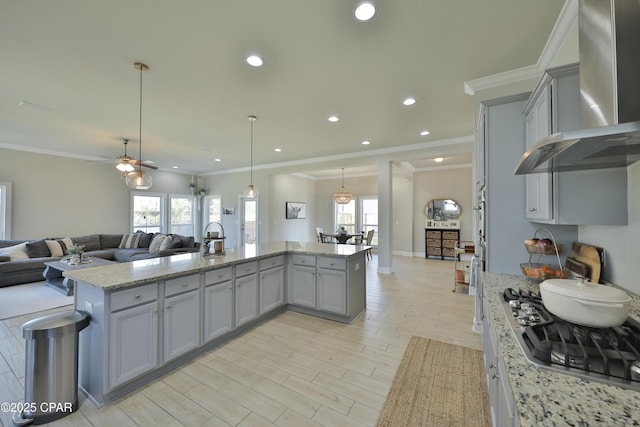 146 Bayou Manor Rd, Santa Rosa Beach, FL 32459 - kitchen featuring open floor plan, gray cabinets, stainless steel gas cooktop, and wall chimney exhaust hood