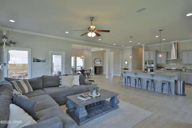 146 Bayou Manor Rd, Santa Rosa Beach, FL 32459 - living room featuring a ceiling fan, recessed lighting, light wood-style floors, and visible vents