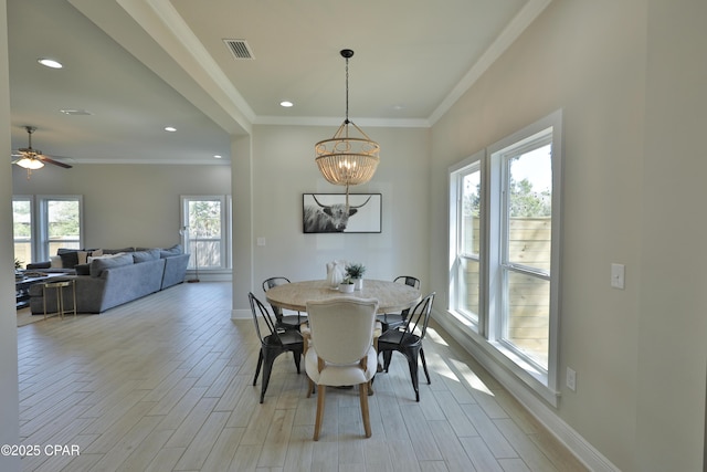 146 Bayou Manor Rd, Santa Rosa Beach, FL 32459 - dining space featuring baseboards, ornamental molding, recessed lighting, and light wood-style floors