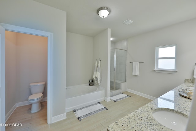146 Bayou Manor Rd, Santa Rosa Beach, FL 32459 - bathroom featuring toilet, a shower stall, a garden tub, visible vents, and wood finished floors