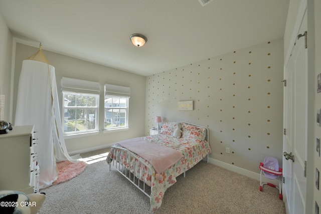 146 Bayou Manor Rd, Santa Rosa Beach, FL 32459 - carpeted bedroom with baseboards and wallpapered walls