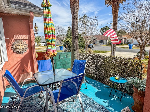 view of patio featuring outdoor dining area