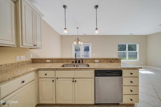 kitchen featuring a sink, an inviting chandelier, cream cabinetry, light stone counters, and dishwasher