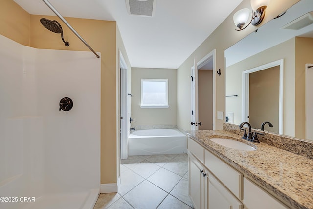 full bathroom with a garden tub, vanity, a shower, and tile patterned floors