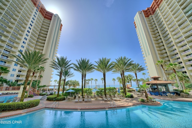 community pool with a patio