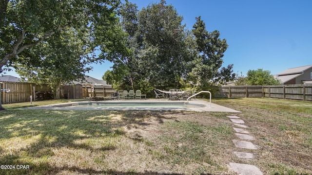 view of yard featuring a patio and a fenced backyard