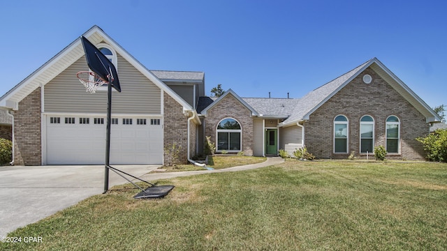 traditional-style house featuring a garage, driveway, a front lawn, and brick siding