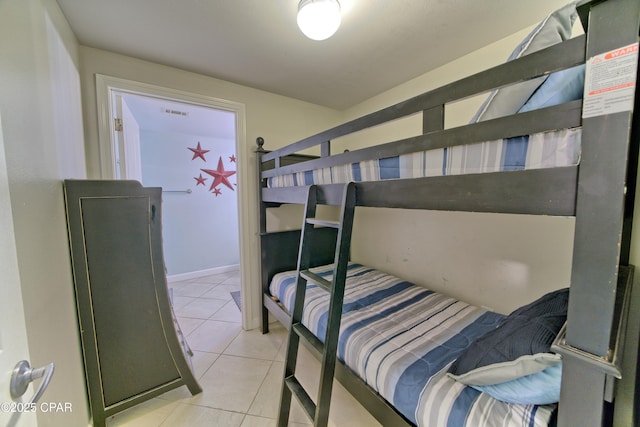 bedroom featuring tile patterned floors and visible vents