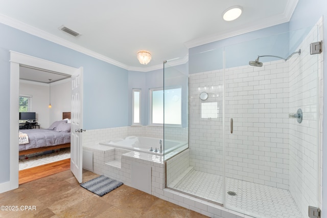 ensuite bathroom featuring a shower stall, visible vents, ornamental molding, a garden tub, and ensuite bath