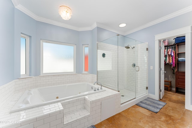 bathroom featuring a shower stall, ornamental molding, and a jetted tub