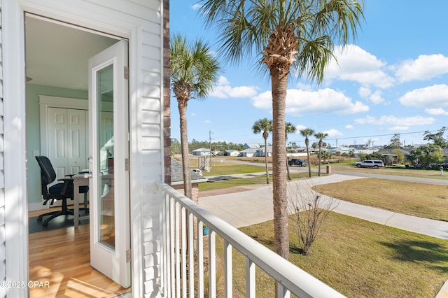 balcony featuring a residential view